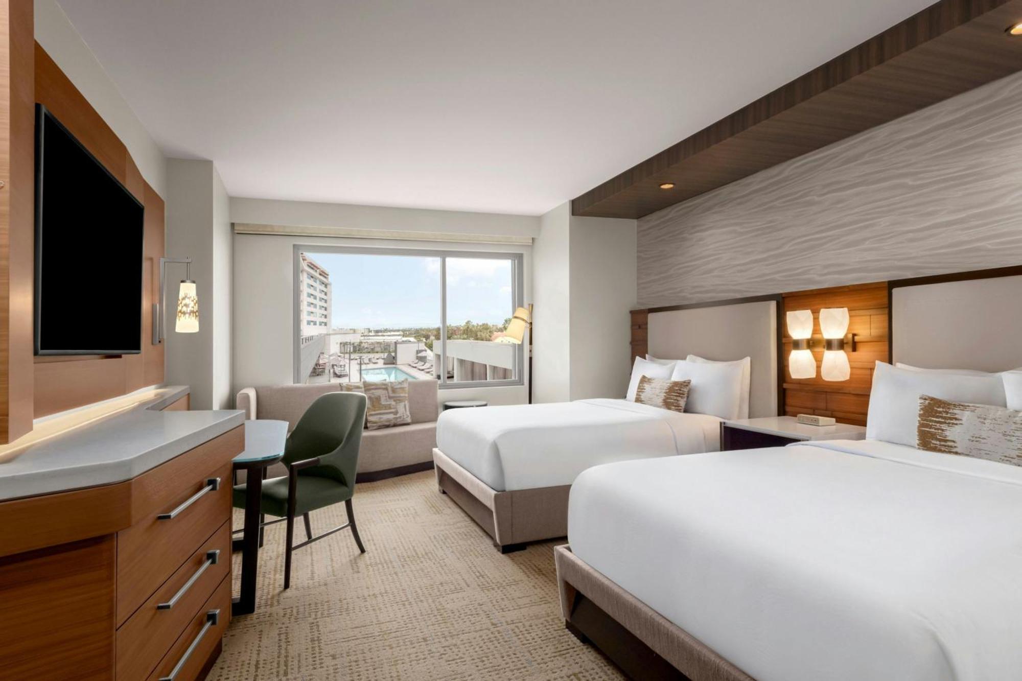 Queen Room Two Queen Beds Pool View Hearing Accessible